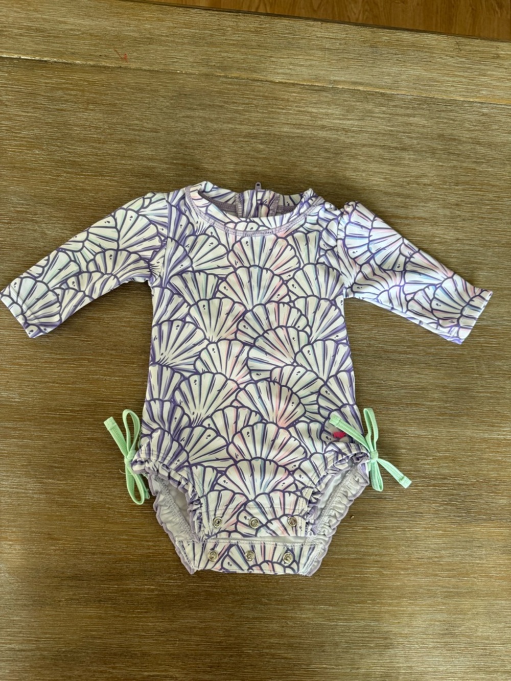 Ruffle Butts Purple and White Shell-Print Long Sleeve One-Piece Swimsuit